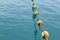 Buoys and deep blue sea