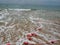 Buoys on a rope in sea water. The lifebuoys are pink restraints to alert people to the depth of the water. Rescue of the