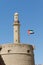 Bur dubai mosque and old history museum with the uae flag