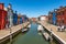 Burano island with Small Canal and Beautiful Multi Colored Houses - Venice Italy