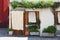 Burano island, Venice, Italy - facade of a house with beautiful curtains near window and door