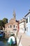 Burano Island, Venice, Veneto, italy and the leaning bell tower of San Martino Church