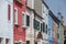 BURANO, ITALY - APRIL 18, 2009: Street with colorful buildings in Burano island, a gracious little town full of canals, near Venic