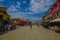 BURANO, ITALY - JUNE 14, 2015: Tourists great place to enjoy the summer and take some pictures of pinturesque Burano