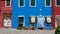 Burano, Venezia, Italy. Street with colorful houses in Burano island