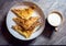 Burek with cheese.Balkanic pie on the plate and yogurt