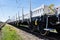 Burgas, Bulgaria - March 20, 2017 - Freight cargo train - 4axled flat wagon white Type:Rens Model:192, B - Transvagon AD