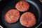 Burger beef meat patties cooking on a pan
