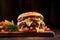 Burger with cheese, lettuce , sauce, onion and cucumber on a wooden board, black background