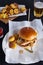 Burger with ketchup on wooden background