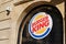 Burger king logo brand and text sign fast food hamburger american restaurant facade