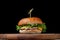 Burger with a latch on a wooden board on a black background