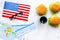 Burger, map, tickets and usa flag for gastronomical tourism to America on marble background top view