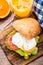 Burger with pouched egg and tomato