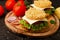 Burger with ramen, salad and tomatoes