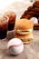 Burger on the table with softdrink cola. Baseball party food with balls for the playoffs