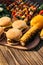 Burgers and corn cooked outdoors on grill