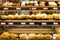 Burgers, donuts and sandwiches in a bakery glass counter