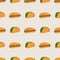 Burgers and hot dogs with greens on a seamless pattern. Geometric arrangement of elements