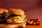 Burgers on a wooden board with potatoes. Tasty photo fast food. Place for text