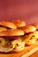 Burgers on a wooden tray with place for a headline. Stock photo