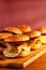 Burgers on a wooden tray with place for a headline. Stock photo