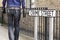 Burglar standing on street with crowbar