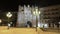 Burgos, Spain - November 14, 2022: People walking in City gate Arco de Santa Maria at night in Burgos, Castilla y Leon