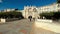 Burgos, Spain - October 18, 2022. Tourists walking through the arch of Santa Maria and medieval bridge in Burgos, Spain