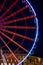 Burgplatz in Dusseldorf at nighttime with colorful red Ferris wheel