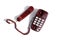Burgundy landline phone stands on a white background