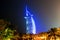 Burj Al Arab glowing at night in Blue