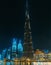 Burj Khalifa in Dubai downtown at night - highest tower building in world, famous UAE landmark