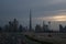 Burj Khalifa and Dubai Skyline under Cloudy Sky, Dubai Downtown Residential and Business Skyscrapers, a view from Dubai Canal