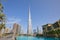 Burj Khalifa skyscraper and artificial lake in a sunny morning in Dubai