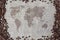 Burlap texture with coffee beans border and world map