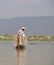 Burma style fishman fishing canoe boat