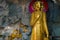 Burmese Buddha statue in buddhist cave temple
