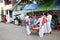 Burmese buddhist novices collecting offerings yangon myanmar