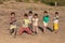 Burmese children are playing near the Buddhist stupa. Mrauk U, Myanmar