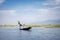 Burmese fisherman catching fish with a net on Inle lake, Myanmar Burma