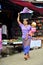 Burmese Mother hold the baby and carrying basin plastic on her h