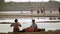 Burmese women from local village washing clothes in Irrawaddy river. Myanmar