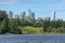 Burnaby, British Columbia, Canada skyline from Deer Lake looking towards Metrotown and apartment complexes on a sunny summer day