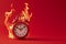 Burning alarm clock. Time out or deadline pressure concept. Clock on fire, symbol of hot sale, discounts, shopping time, countdown