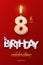 Burning Birthday candle in the form of number 8 figure and Happy Birthday celebrating text with party cane isolated on