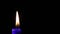 Burning blue candle