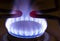 Burning blue gas on the stove.  Blue flames of gas burning from a kitchen gas stove .