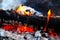 Burning bonfire in camp, preparing charcoal for barbecue, natural fuel, abstract fire natural background