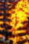 Burning bonfire with flames consuming logs, fractal effect.